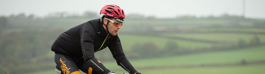 Sportive rider riding across Devon